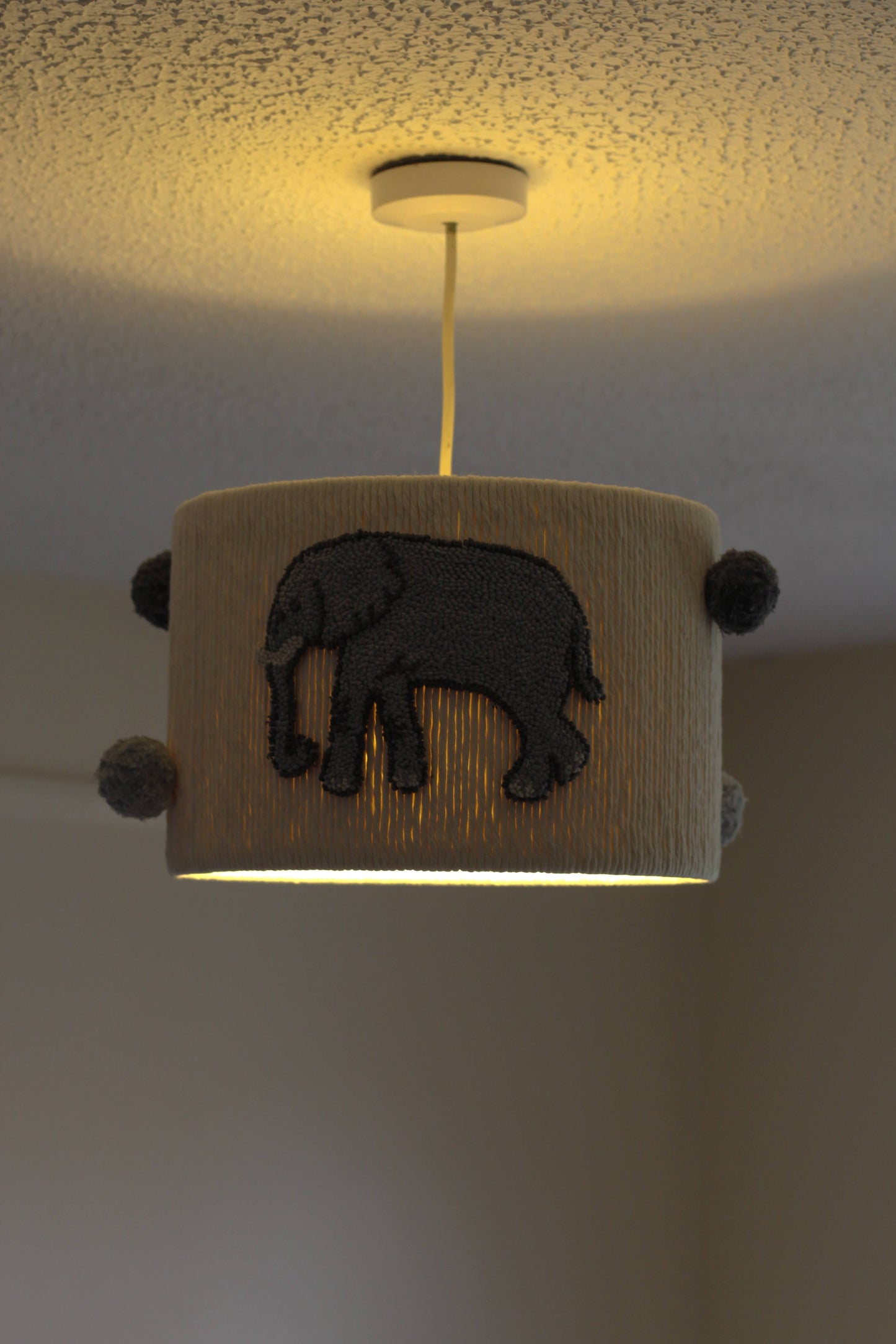 ELEPHANT THEMED LAMPSHADE decorated with elephants and pom poms